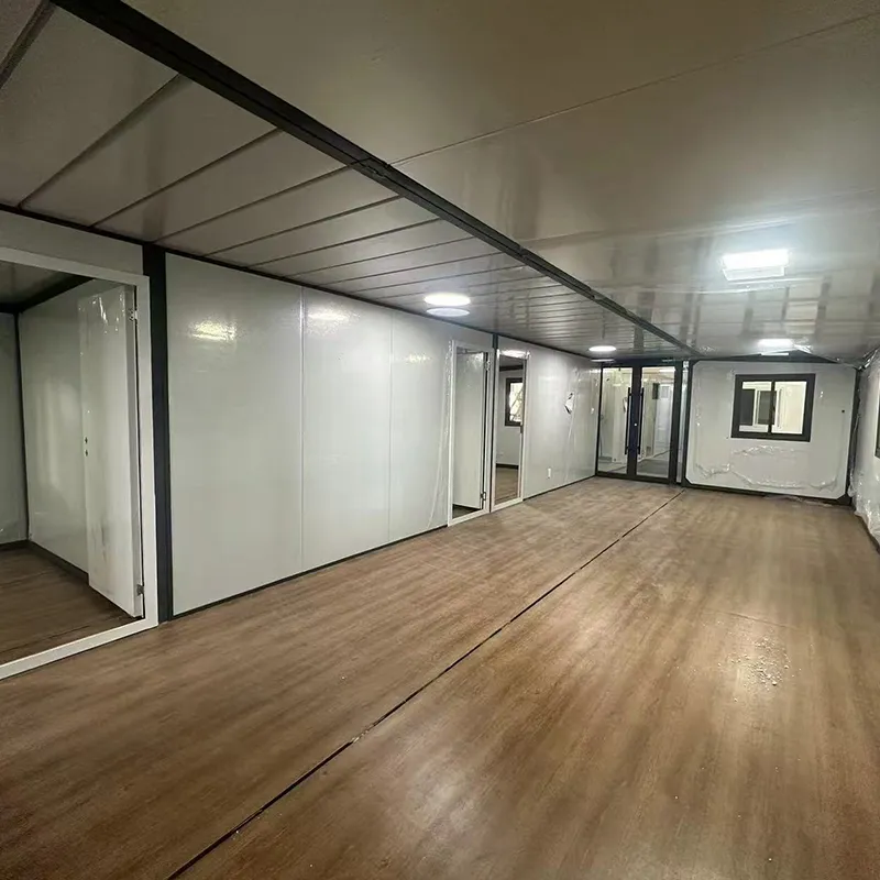 Interior view of bahria homes Castle Expandable House E40 showing open layout with wood flooring and modern panel walls in a modular prefab home design